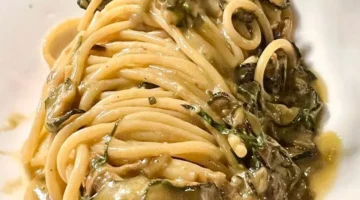 أسرار تحضير طبق “لينجويني ألا نيرانو” الإيطالي الشهير على أصوله المنزلية